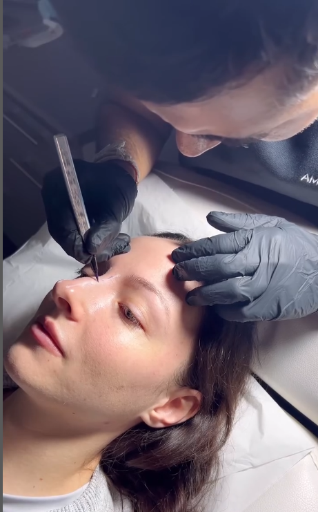 Experienced practitioner mr AMS doing non surgical rhinoplasty